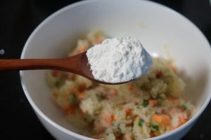 Gradually add the flour, one tablespoon at a time.