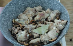 Sear the Ribs: Heat 1 tbsp oil in a wok or skillet over medium-high heat. Add the ribs and fry for 3-5 minutes until the edges are golden brown and the fat begins to render.