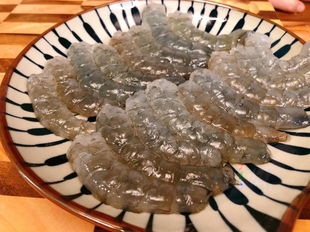 Then, use the back of the knife to "chop" it into a mud-like paste.