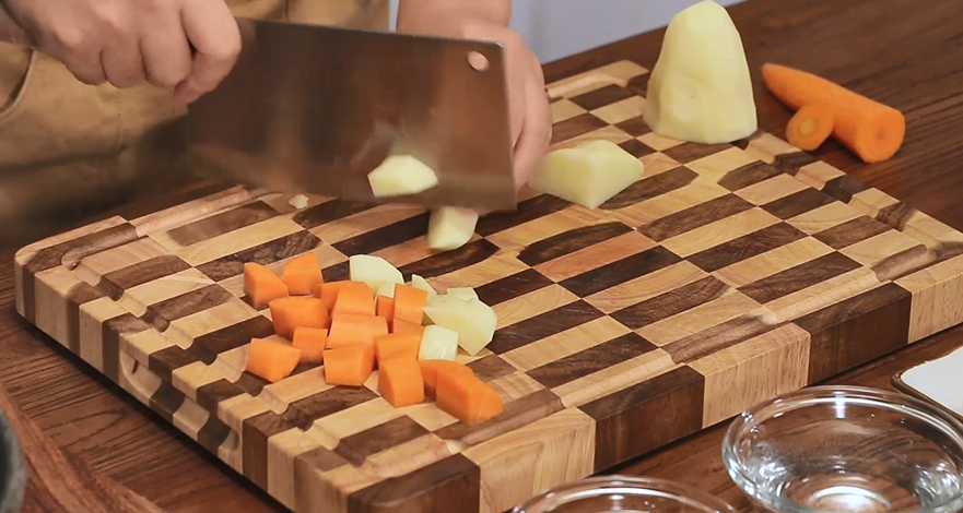 Cut the Veggies: Peel the potato and carrot. Cut them into small, uniform cubes.