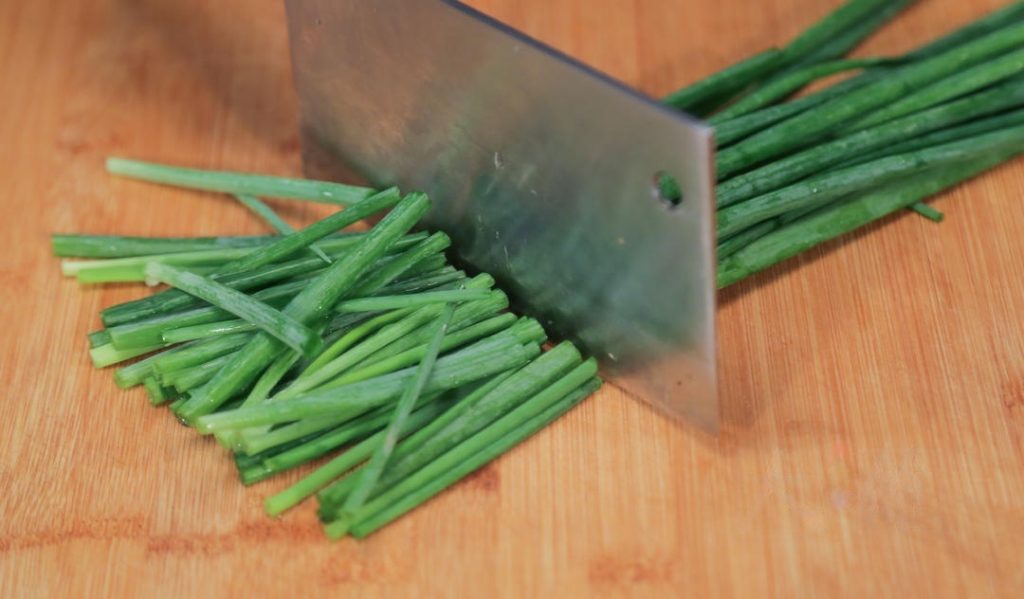 Prepare the Scallions Wash the scallions thoroughly.