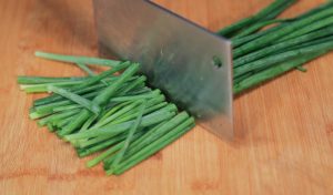 Prepare the Scallions Wash the scallions thoroughly.