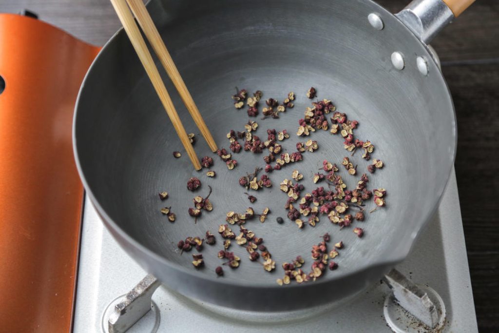 Toast and Crush Peppercorns