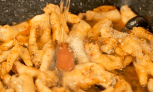 The Braise: Pour in the can of beer. The liquid should just cover the ingredients. If it doesn't, add a little hot water or stock. Bring to a boil.