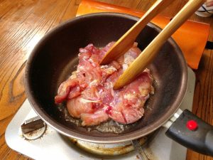 Sear the Chicken: Heat your flat-bottomed pan over low heat and add 1 tbsp of oil. Place the chicken in the pan, skin-side down.