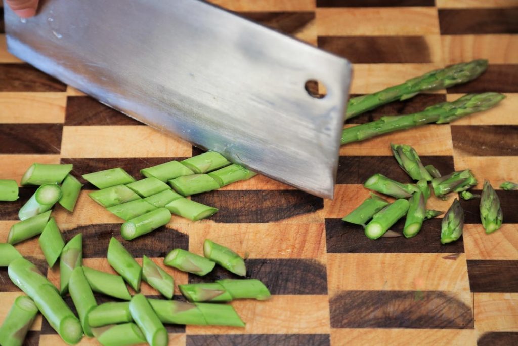 Prep the Vegetables: Wash the asparagus. Remove the tough woody ends. Cut the stems into 1.5-inch (4cm) sections.