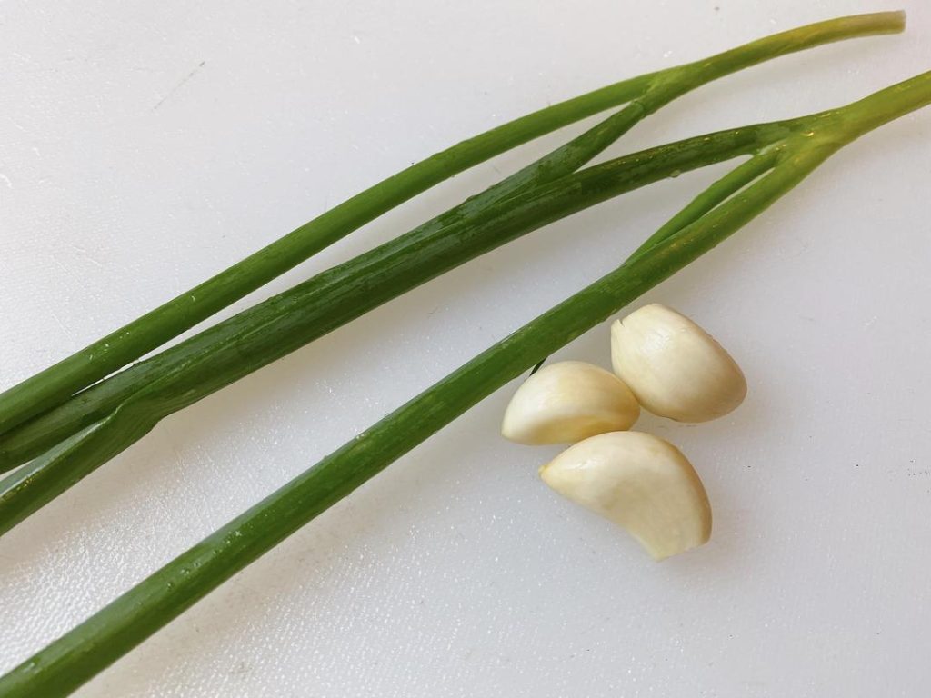 Aromatics: Cut the scallions into small sections (separating whites and greens) and finely mince the garlic.