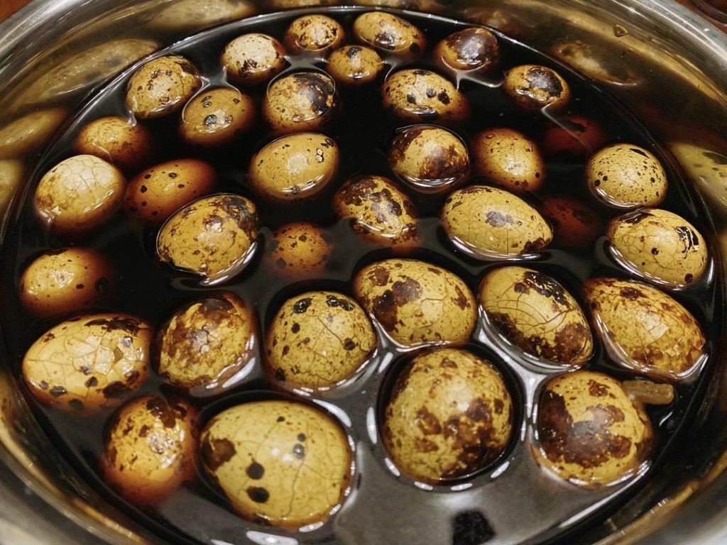After 1 hour, turn off the heat. Do not remove the eggs! Let them sit in the braising liquid as it cools down to room temperature. For the absolute best flavor, transfer the eggs and the liquid to an airtight container and let them steep in the refrigerator overnight.