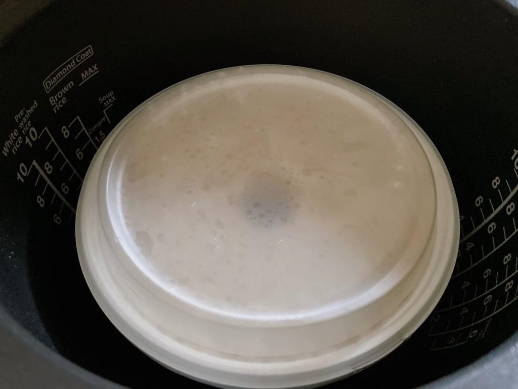 Ferment (36-48 hours): Cover the container tightly. Place it in a warm, dark place, ideally around 25°C (77°F). Ferment for 1 to 2 days. If making this in winter, wrap the container in a towel for warmth; it may take 3 to 4 days.