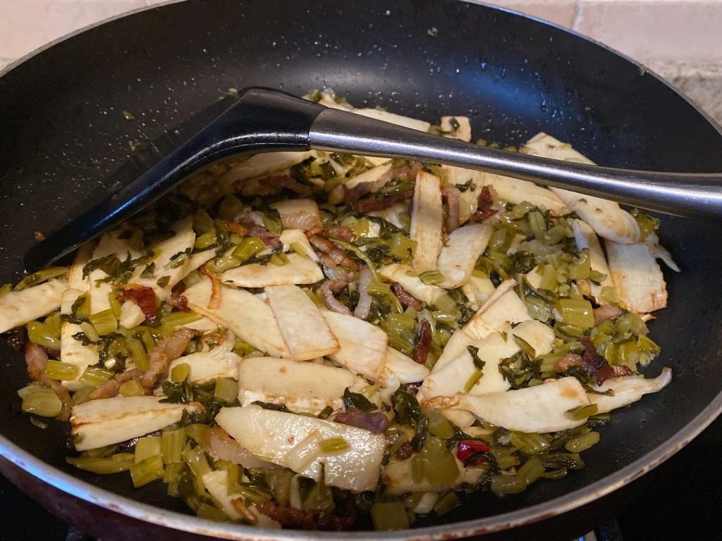 Incorporate the Snow Cabbage (1–2 minutes): Add the snow cabbage to the wok. Toss everything together until the greens are fragrant and well-distributed.
