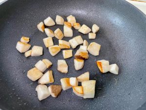 Sear the Mushrooms: Heat your wok or skillet over medium heat. Add 1 tablespoon of cooking oil. Add the cubed mushrooms and stir-fry until the surfaces turn golden brown, about 3 to 4 minutes. Remove and set aside. Why? This removes water and concentrates their earthy flavor.