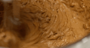 Incorporate Eggs Pour the date paste into a large mixing bowl. Crack in 4 large eggs, one at a time. Using a hand mixer or whisk, beat until large bubbles form.