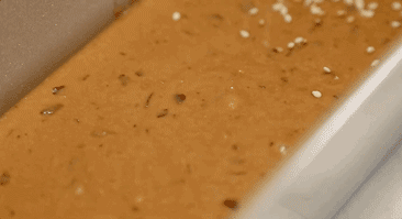 Add the Oil Pour in 1/3 cup (70g) of neutral cooking oil (or melted butter). Again, mix quickly until just combined. The batter should be thick and dark.