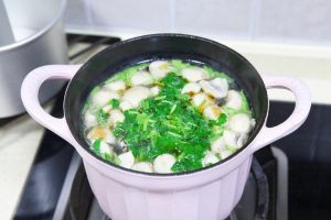 Season and Serve: Add the light soy sauce and salt. Stir to combine. Turn off the heat. Sprinkle with chopped cilantro and drizzle with sesame oil. Serve immediately while piping hot.