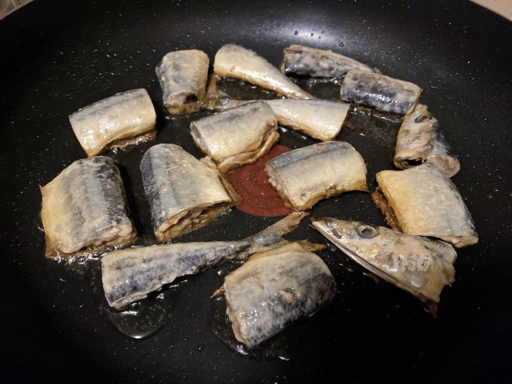 Sear: Heat oil in a non-stick skillet over low heat. Pan-fry the fish pieces until lightly golden on both sides.