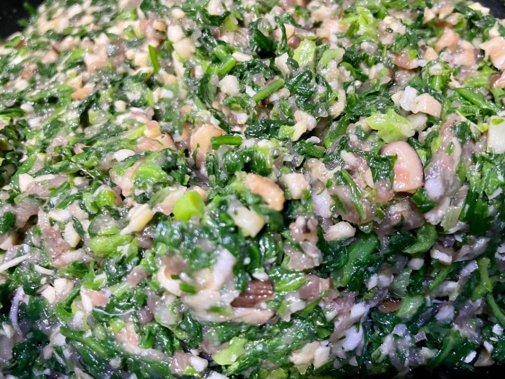 Stir vigorously: Use chopsticks to stir the mixture rapidly in one direction for 3 minutes until it becomes sticky. Why? This technique develops the myosin proteins in the meat, giving the filling a bouncy, cohesive texture.
