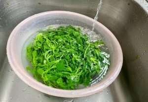 Ice bath: Immediately transfer the greens into a bowl of ice-cold water. Why? This stops the cooking process immediately, preventing the greens from turning mushy and grey.