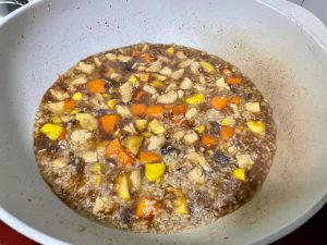 Transfer and Add Water: Transfer the entire mixture into your rice cooker insert. Add a suitable amount of boiling water. Crucial step: The water level should be noticeably lower than your usual rice-to-water ratio, barely reaching the top of the rice mixture.