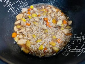 Cook: Place the insert into the rice cooker. Select the "Sweet/Fragrant Rice" or standard "White Rice" setting and press start.