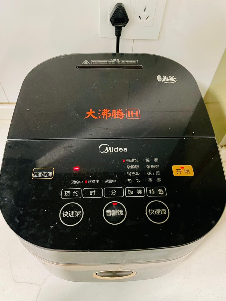 Cook: Place the insert into the rice cooker. Select the "Sweet/Fragrant Rice" or standard "White Rice" setting and press start.