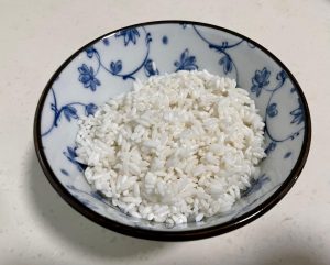 First, wash the rice until the water runs clear. Cover it with fresh water and let it soak for exactly 30 minutes. Drain thoroughly.