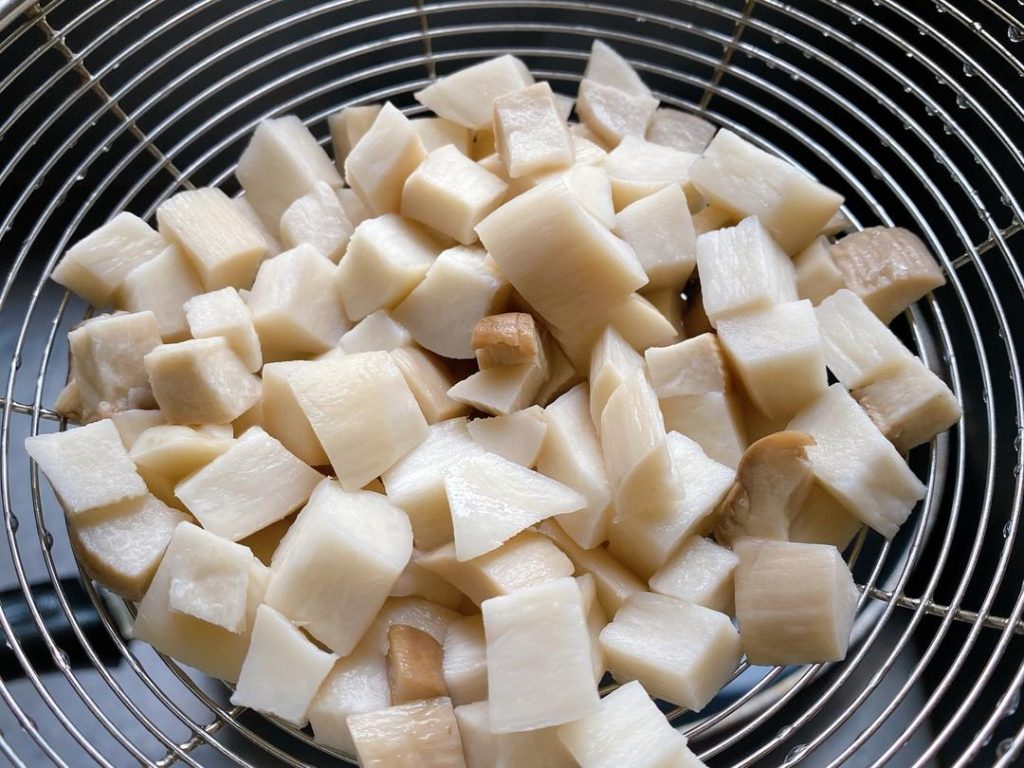 Blanch the Mushrooms: Bring a pot of water to a boil. Add the diced mushrooms and blanch for 2 minutes. Afterward, rinse them under cold water and gently squeeze out the excess moisture. This is crucial to prevent a watery stir-fry.