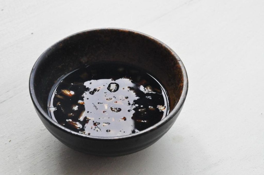 Make the Dipping Sauce In a small saucepan, combine the Light Soy Sauce, Dark Soy Sauce, and water. Bring the mixture to a boil over medium heat. Once boiling, remove from heat immediately and stir in the chopped scallion whites.