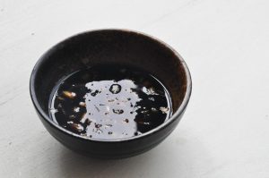 Make the Dipping Sauce In a small saucepan, combine the Light Soy Sauce, Dark Soy Sauce, and water. Bring the mixture to a boil over medium heat. Once boiling, remove from heat immediately and stir in the chopped scallion whites.