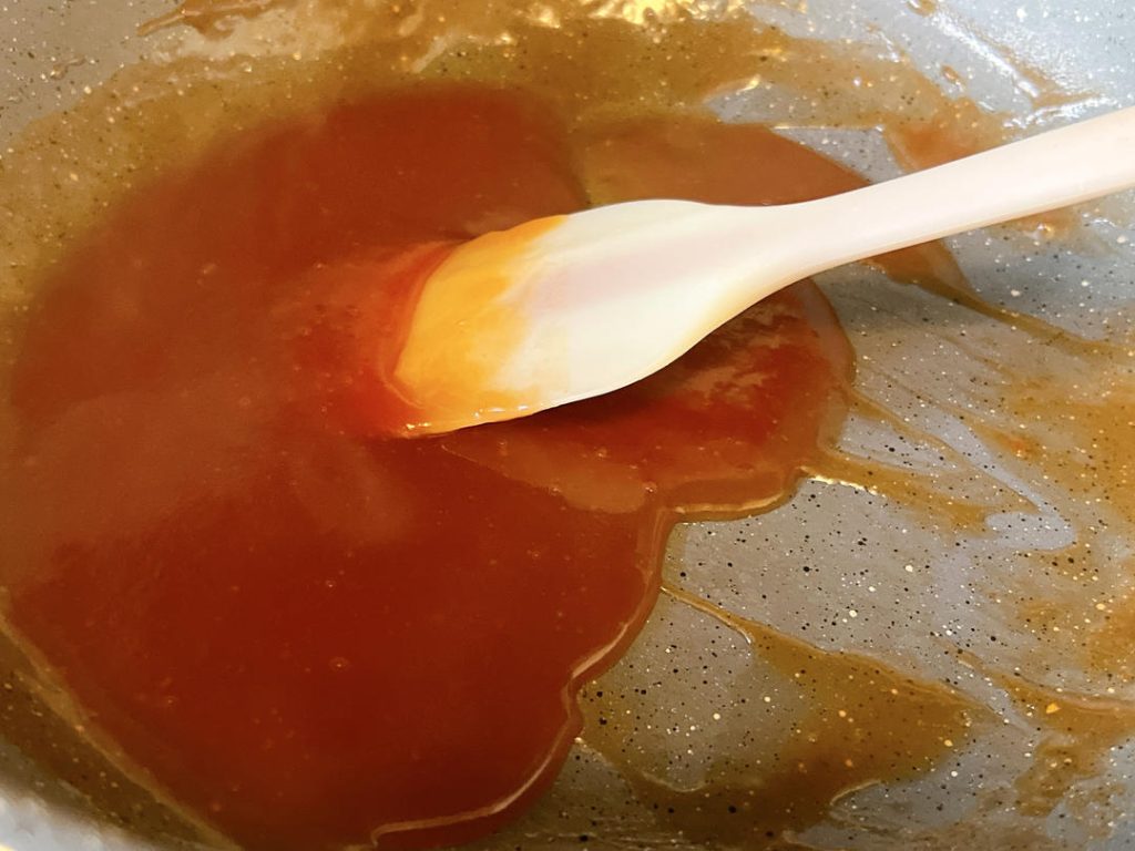Simmer the Sauce: Lower the stove to medium-low heat. Give your pre-mixed sauce a quick stir to dissolve the settled starch, then pour it into the pan.