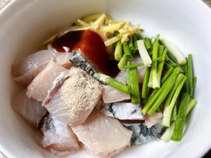 Finally, add the oyster sauce, salt, white pepper, ginger, scallion, and 1 tablespoon of cornstarch. Let it marinate for exactly 15 minutes.