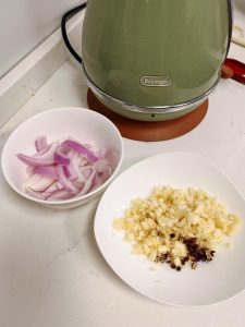 The Second Layer of Flavor Uncover and stir in the Oyster Sauce. At this point, add the remaining minced garlic, Sichuan peppercorns, and diced onion (if using). Stir well. Cover and simmer for another 5 minutes.