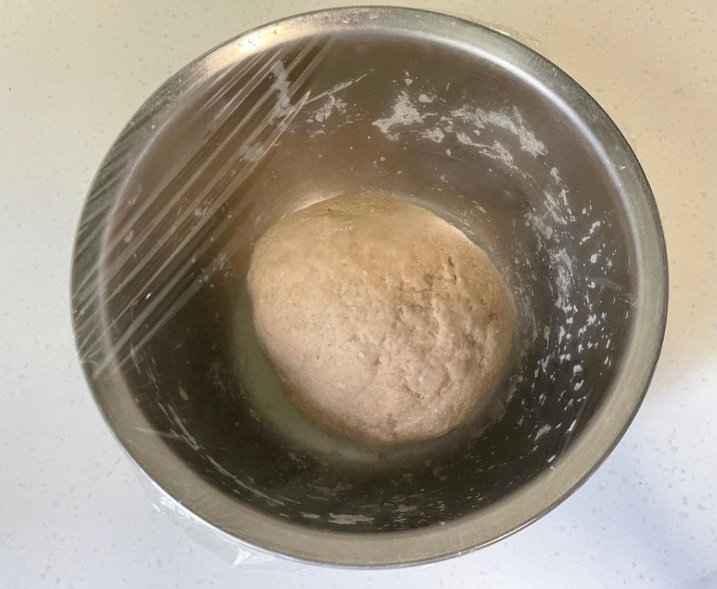 Cover the bowl tightly with plastic wrap. Let it rest in a warm spot for 30 minutes.