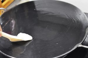 Heat the Pan Heat a large non-stick pan or crepe maker over medium-low heat. Brush a very thin layer of oil onto the surface. You do not want pools of oil, or the batter will slide around instead of sticking and spreading.