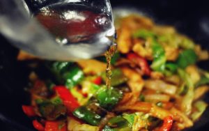 Create the Sauce Pour in a small amount of water (about 1/4 cup). This is crucial—it turns the thick Gochujang paste into a glossy sauce that can coat every ingredient.