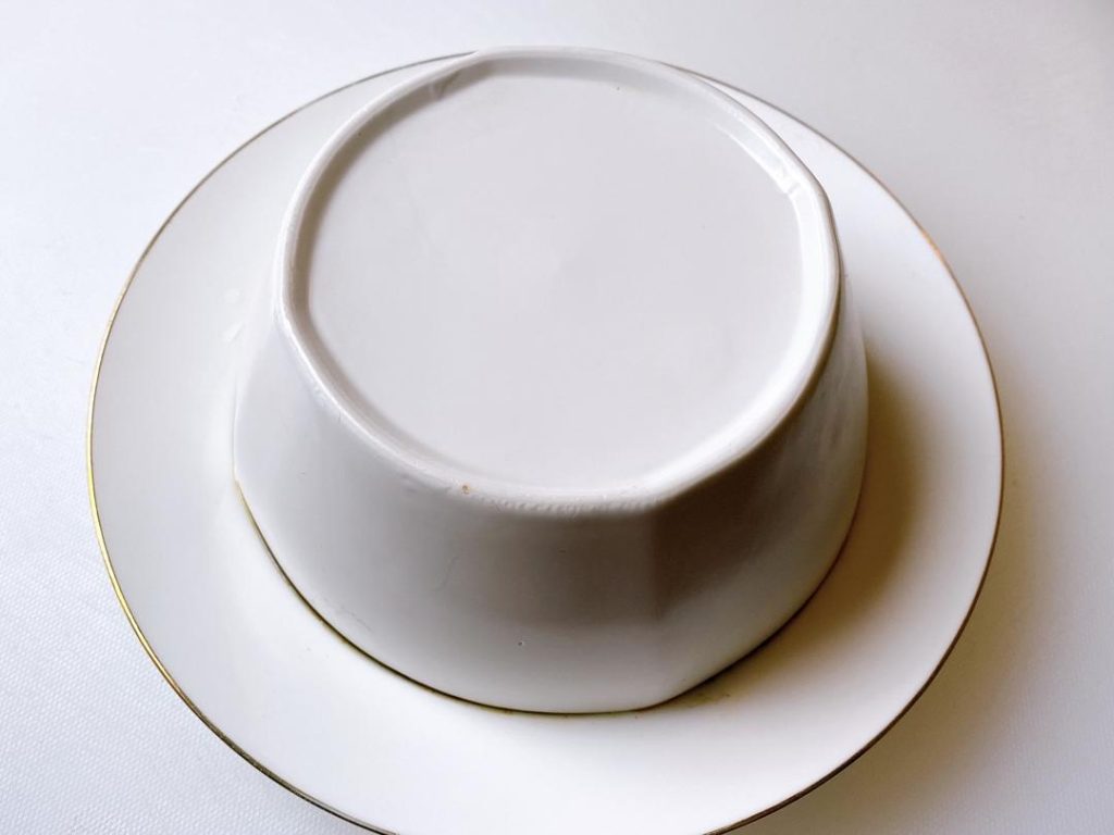 Remove the bowl from the steamer. Place a serving plate upside down over the bowl, and carefully flip them together. Lift the bowl off. If there is excess liquid, pour it into a saucepan, thicken it with a little cornstarch slurry, and pour it over the pork for a glossy finish.