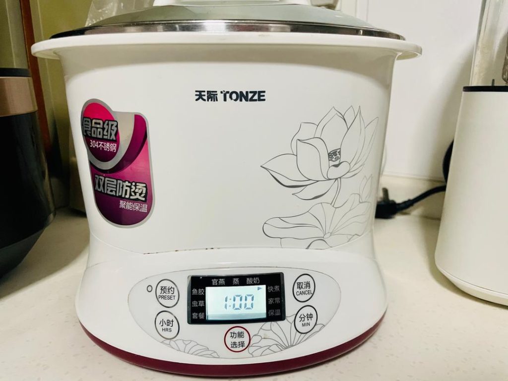 Stew for 1 Hour: Let the congee simmer gently for exactly 1 hour. Stir occasionally to prevent the rice from sticking to the bottom. Visual cue: The congee is done when the rice grains have burst open and the liquid is thick and creamy. The pork should easily pull away from the bone.