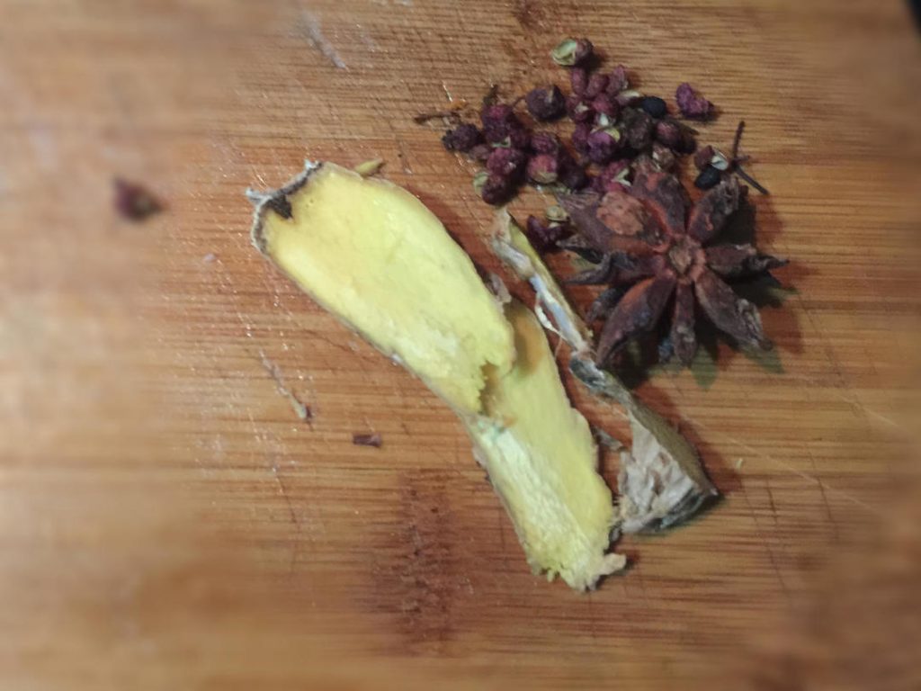 Prep Aromatics: Have your ginger, scallion, star anise, and peppercorns ready in a small dish.