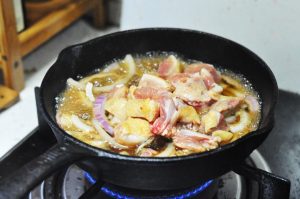 Cook the Chicken: Add the chicken pieces to the boiling sauce. Simmer until the chicken is cooked through.