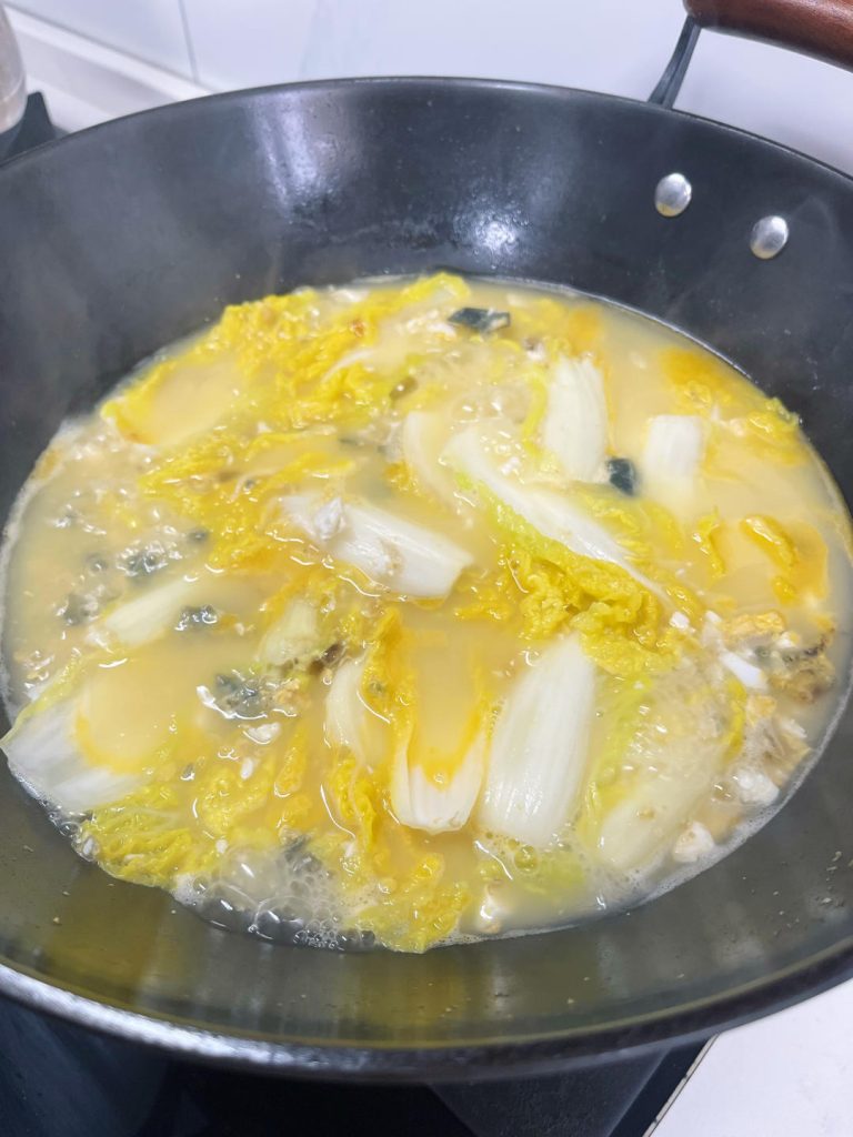 Simmer: Reduce heat to medium and simmer for 3-5 minutes. You want the cabbage to be tender (softened stem) but not mushy.