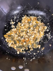 Add Aromatics: Add the garlic, ginger, and diced ham. Stir-fry for another minute until the ham releases its aroma.