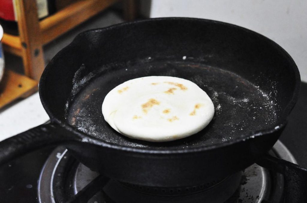 Dry Fry: Heat a skillet over medium-low heat. Do not add oil. Place the buns in the pan. Cook for about 2 minutes on each side until you see a nice golden "tiger skin" pattern.