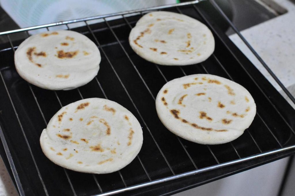 Bake: Transfer the buns to an oven preheated to 350°F (180°C). Bake for 10 minutes to ensure the inside is fully cooked through.