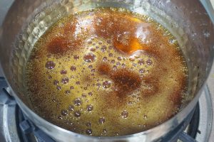 The Amber Stage Continue cooking until the syrup reaches a deep amber color (like an old penny).