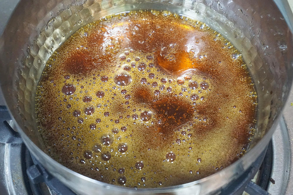 The Amber Stage
Continue cooking until the syrup reaches a deep amber color (like an old penny).