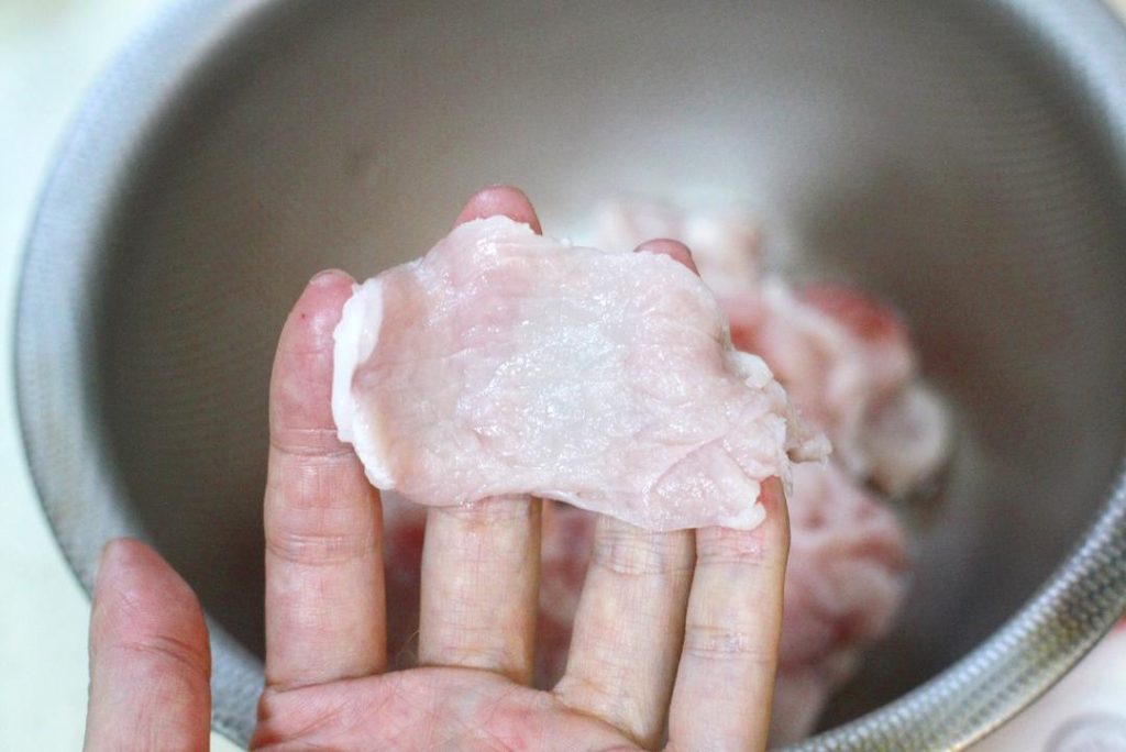 Knife Skills: Slicing the meat thinly (about 3mm) and evenly is critical. Partially freezing the pork for 30 minutes makes this much easier.