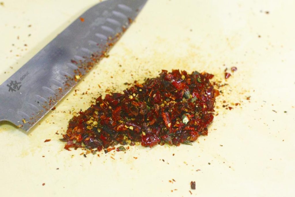 Ventilation: Toasting chilies and the final oil splash create smoke and spice fumes. Turn your exhaust fan to high!