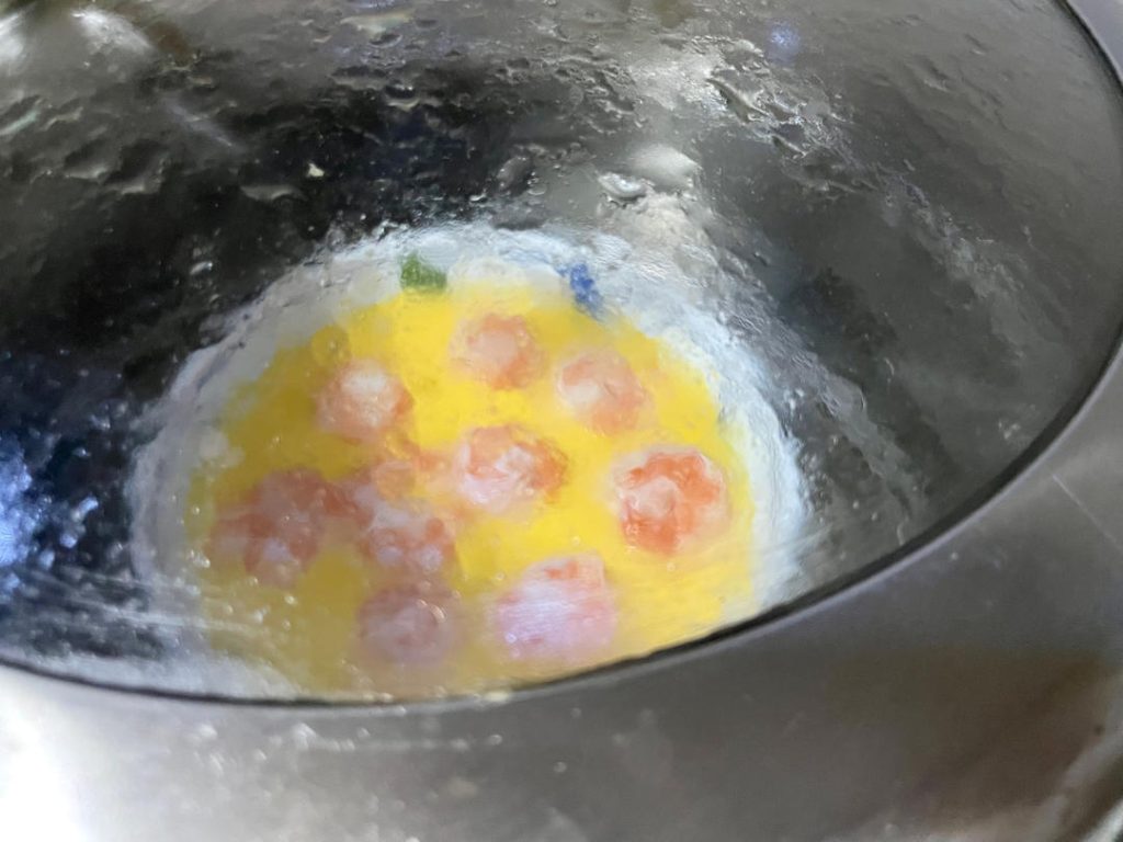 The Second Steam: Cover the pot again and continue steaming over medium-high heat for another 4 to 5 minutes. The dish is done when the shrimp turn completely opaque and pink, and the egg is fully set.