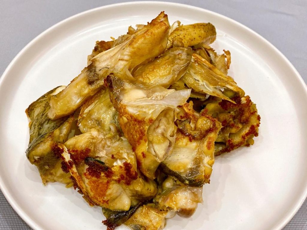 Golden Crust
Let the fish sear undisturbed for 4-5 minutes until the bottom is a deep golden brown. Carefully flip and sear the other side for another 3-4 minutes. Once golden on both sides, gently remove the fish chunks to a plate and set aside.