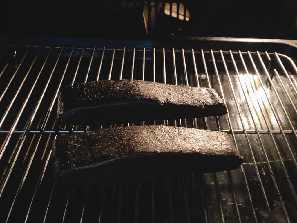 Bake (60 mins): Place the wrapped salmon strips on your prepared wire rack. Bake in the preheated 170°F (75°C) oven for exactly 1 hour.