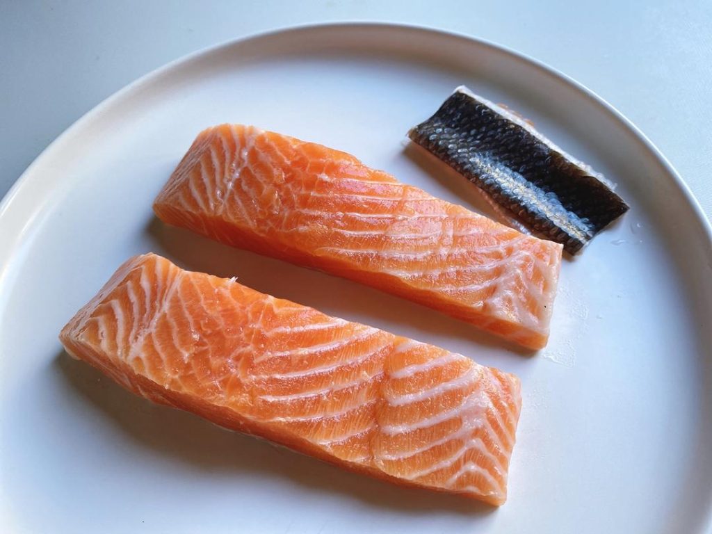 Prepare the Salmon (5 mins): Remove the skin from your salmon fillet. Cut the fish into thick, even strips, about 1-inch wide. Uniform slices ensure everything cooks at the exact same rate.